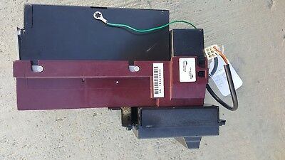 A vending machine component removed for repair
